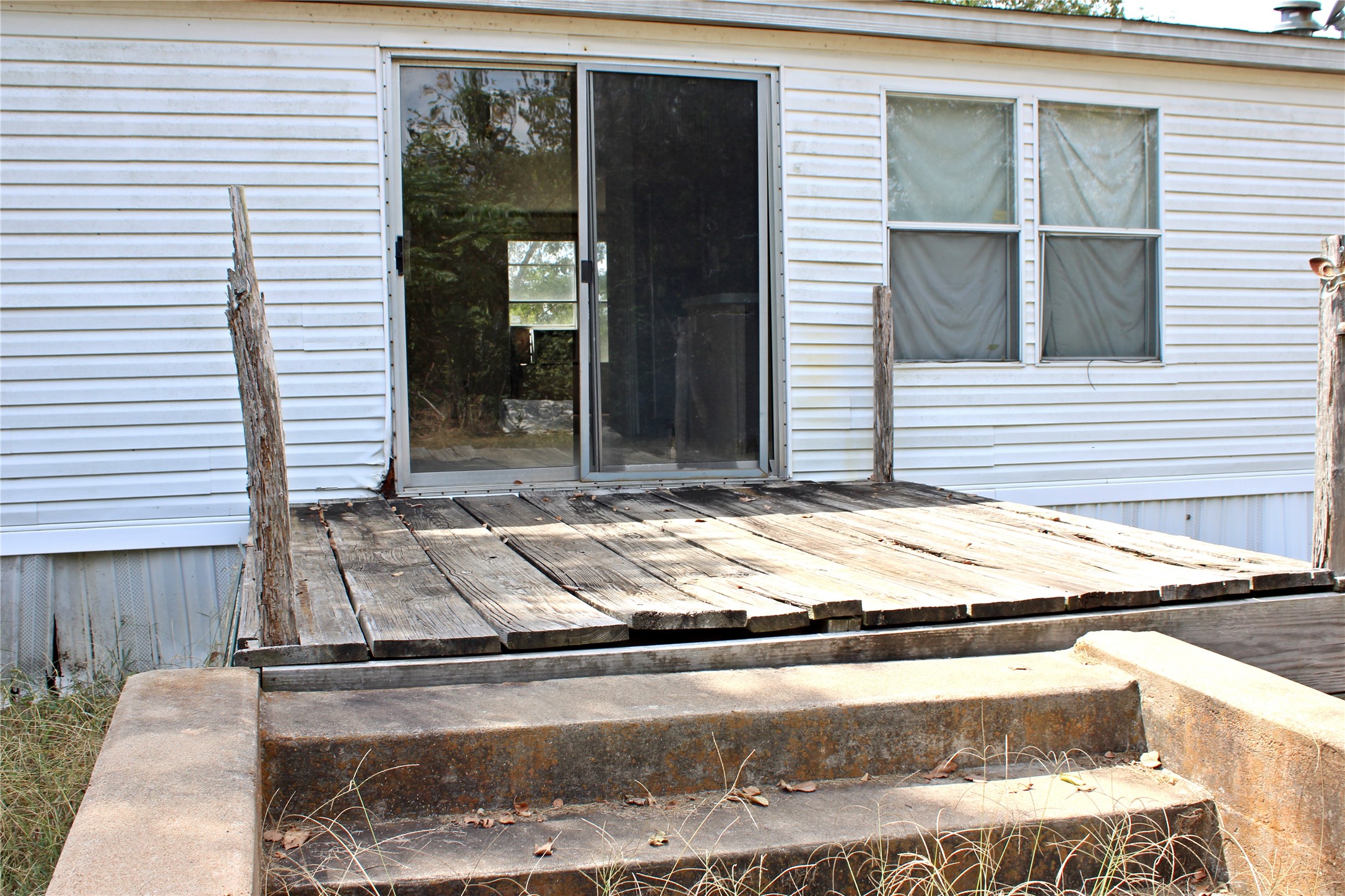 601 Travis Street Alleyton, TX 78935 - Photo 11 of 17 a view of house with backyard