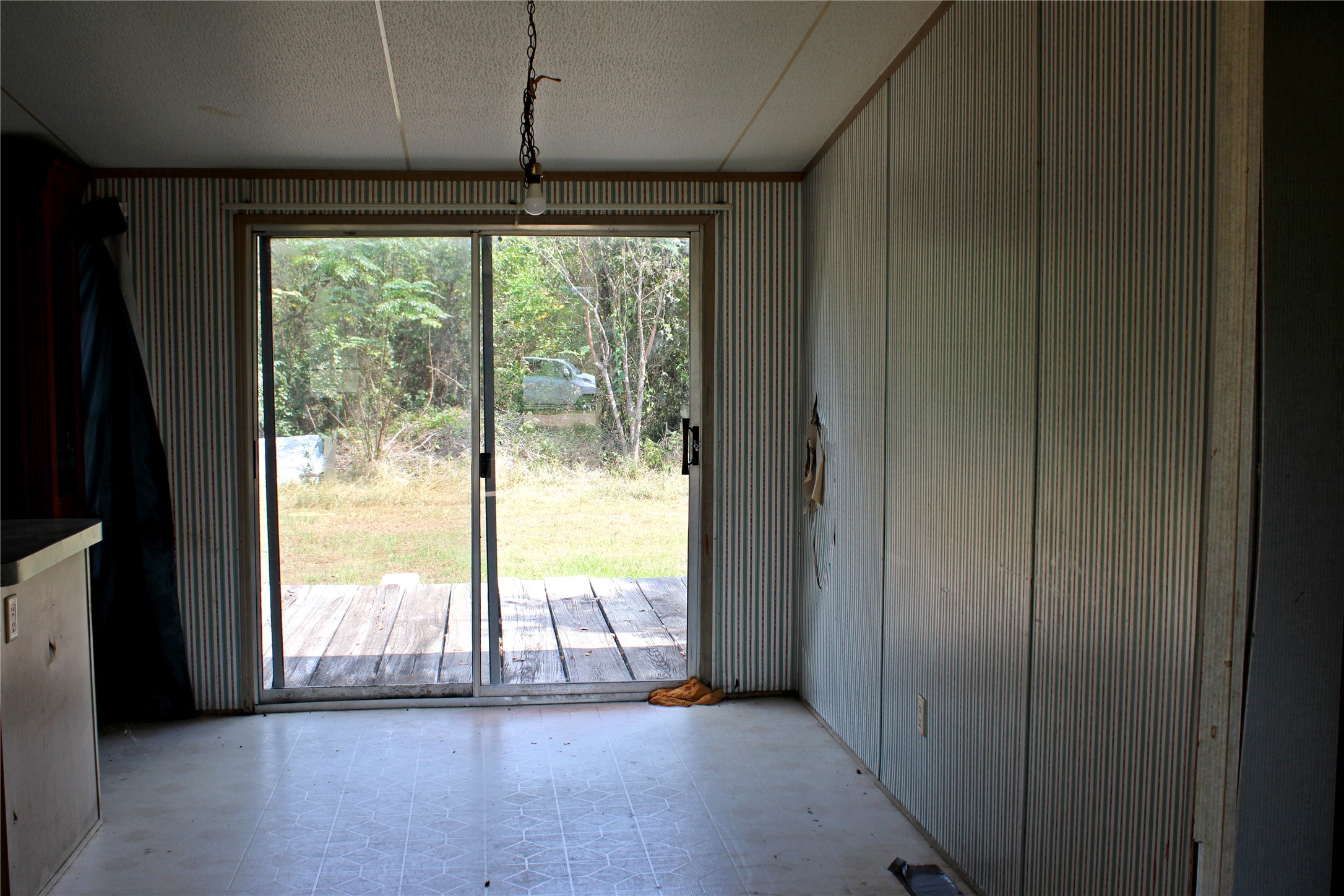 601 Travis Street Alleyton, TX 78935 - Photo 5 of 17 a view of an empty room and window
