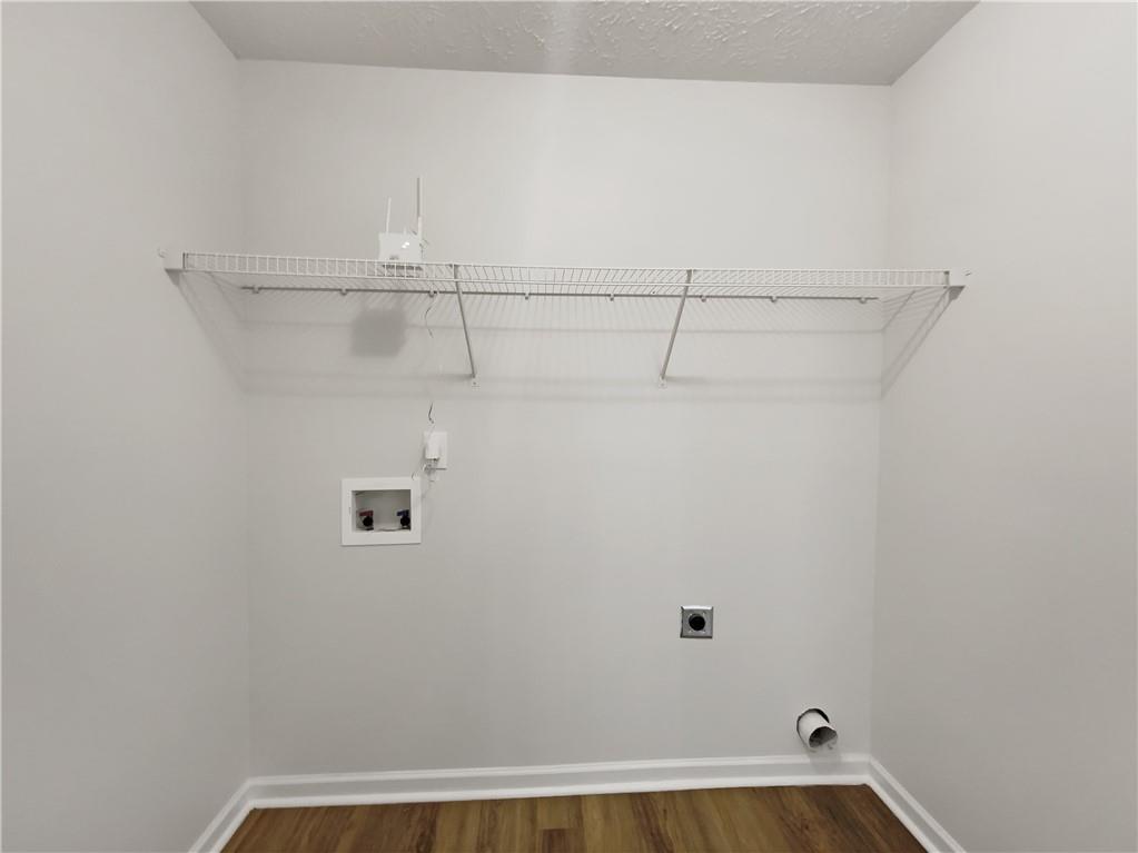 107 Jasons Ridge Griffin, GA 30223 - Photo 12 of 24 a view of a room with racks on the wall