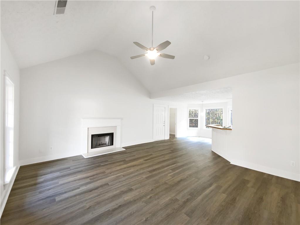107 Jasons Ridge Griffin, GA 30223 - Photo 3 of 24 wooden floor in an empty room with a window