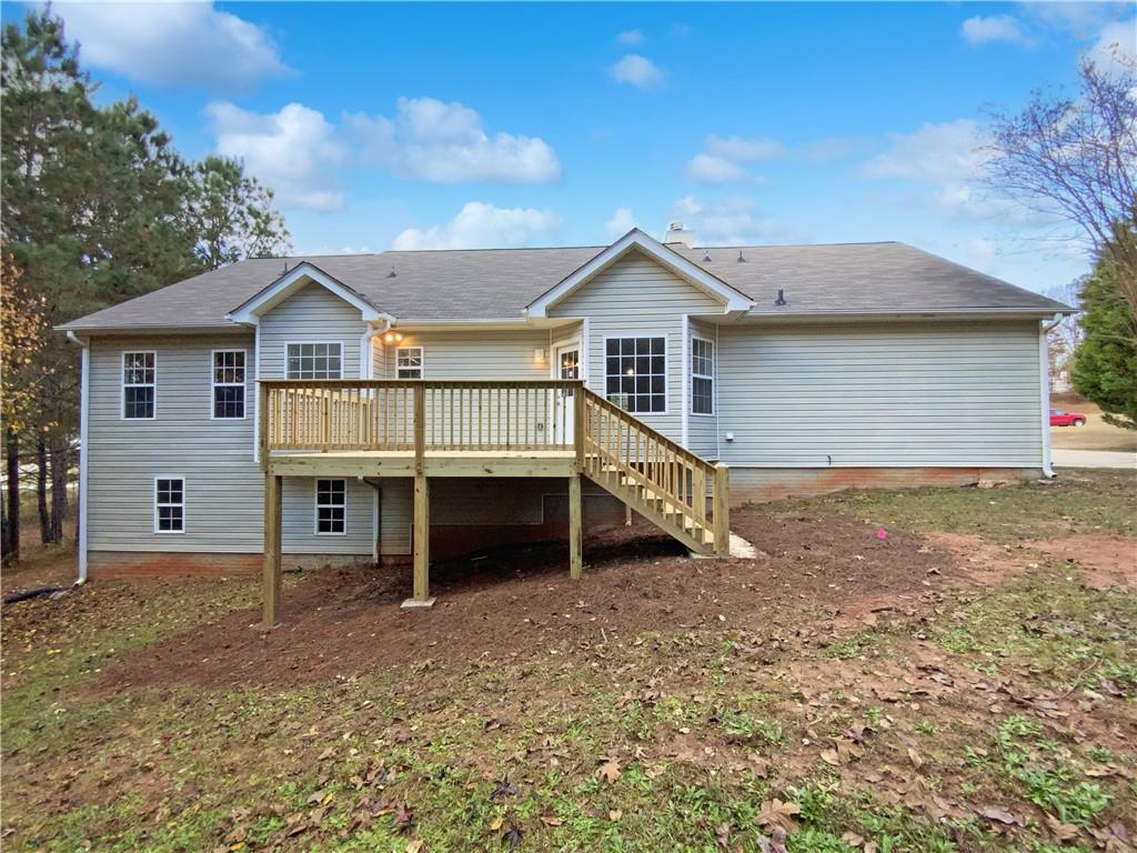 107 Jasons Ridge Griffin, GA 30223 - Photo 5 of 24 a view of a house with a yard and garage