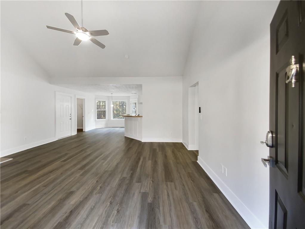 107 Jasons Ridge Griffin, GA 30223 - Photo 7 of 24 wooden floor in an empty room with a window