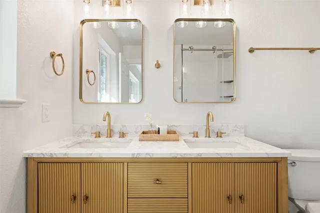 a bedroom with a bed and dresser