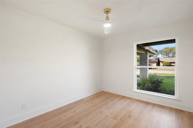 a bathroom with a double vanity sink toilet and shower
