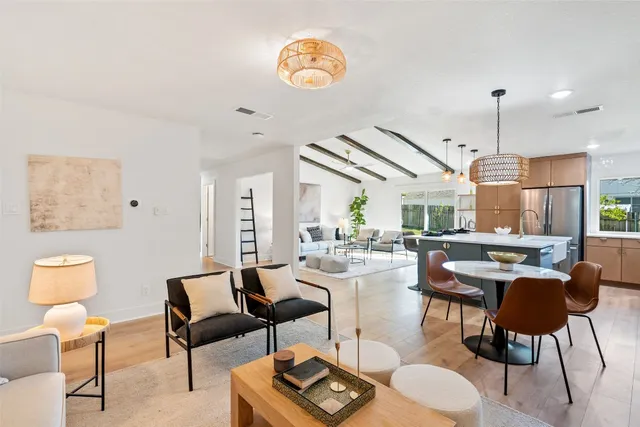 a living room with furniture and a lamp