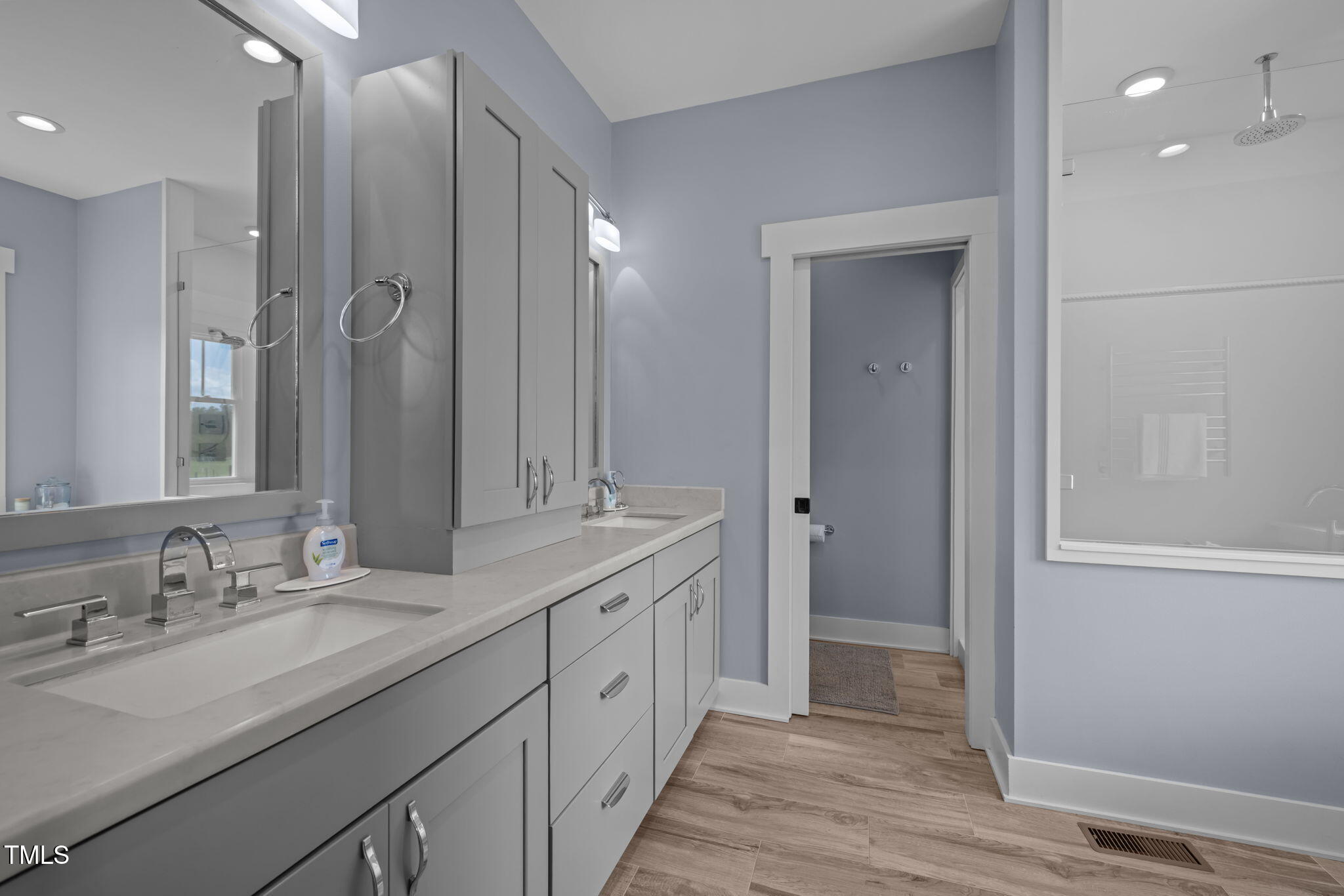4715 Uzzle Road Rougemont, NC 27572 - Photo 26 of 68 a spacious bathroom with a double vanity sink mirror and double