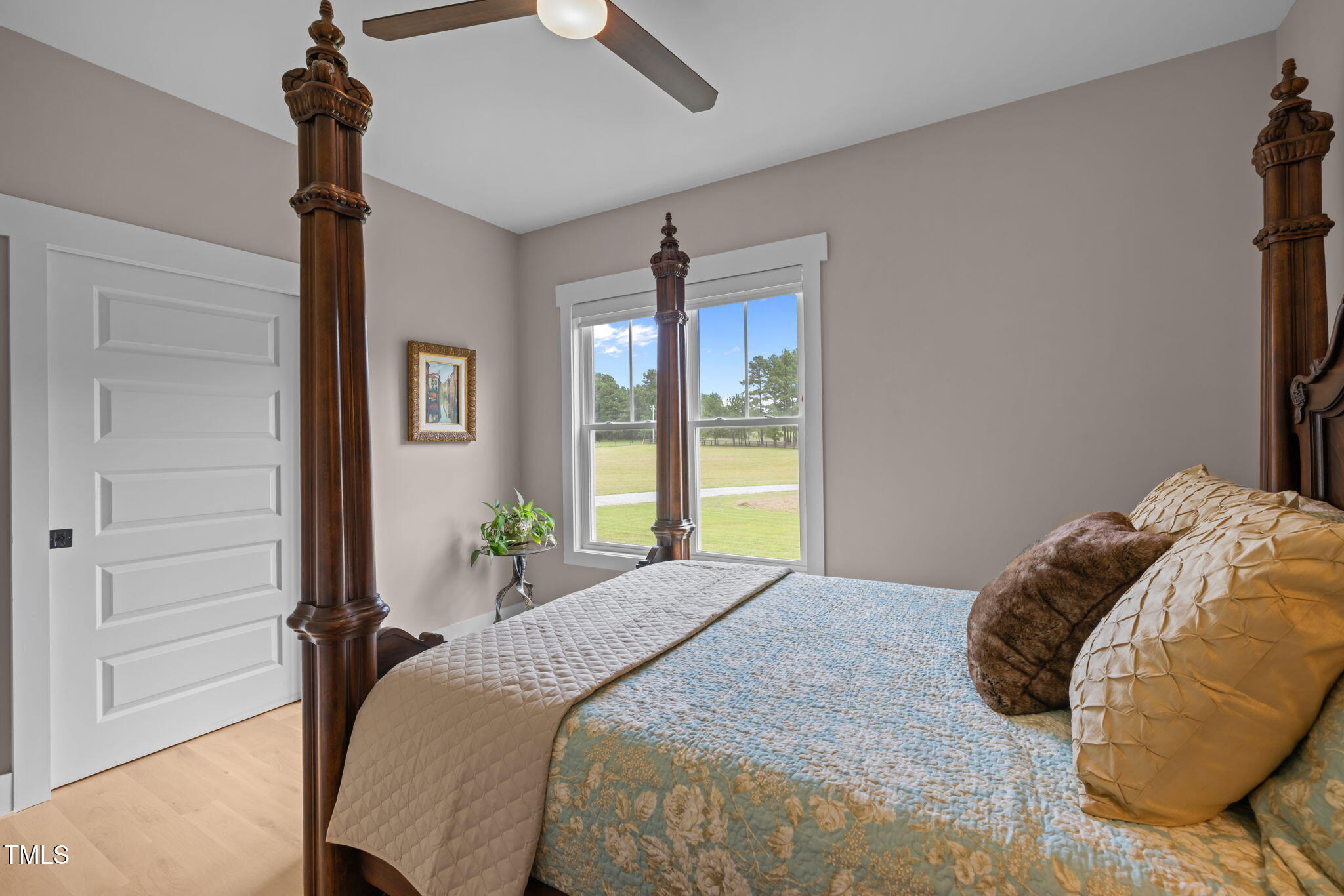 4715 Uzzle Road Rougemont, NC 27572 - Photo 31 of 68 a bedroom with a bed and a window