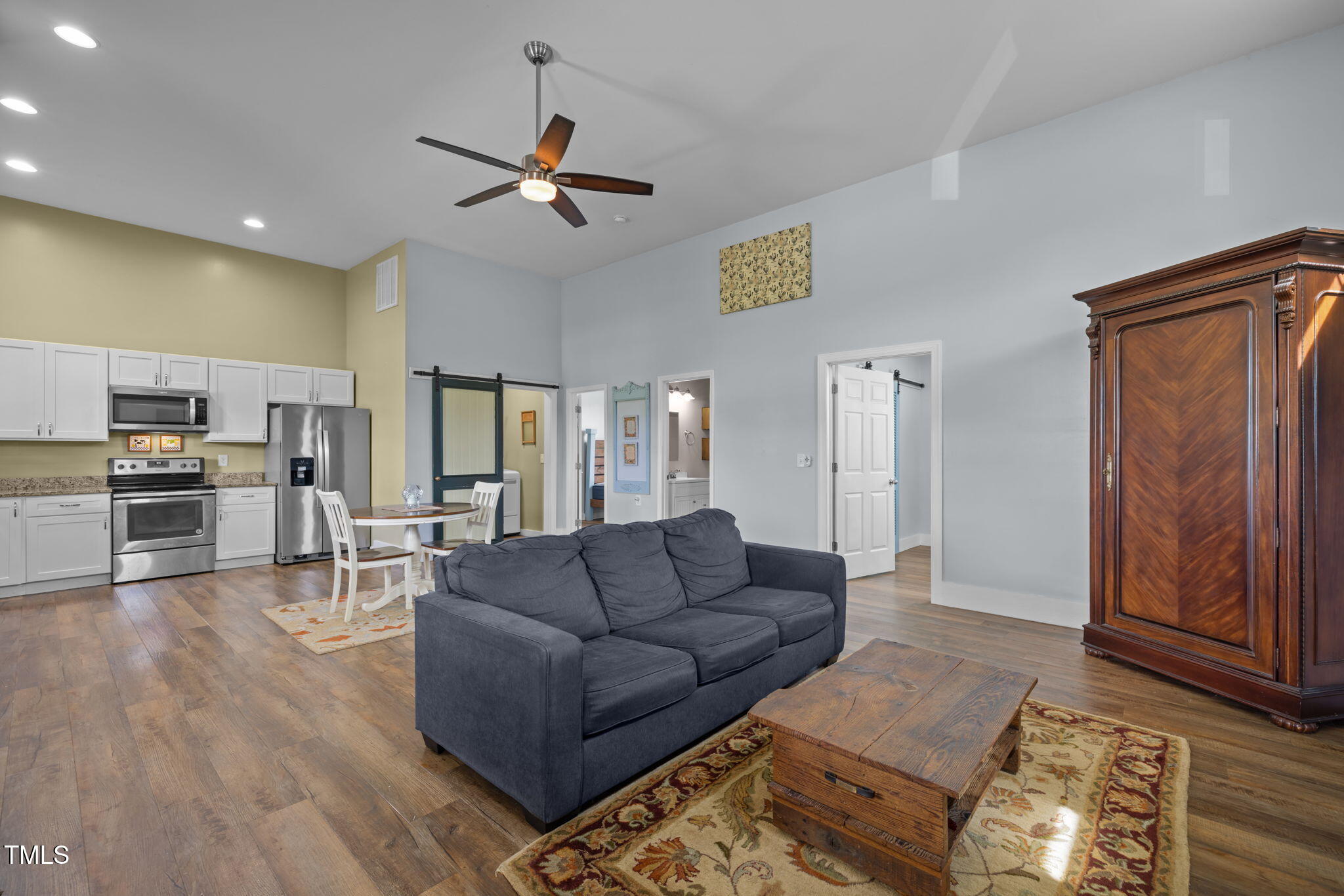 4715 Uzzle Road Rougemont, NC 27572 - Photo 43 of 68 a living room with furniture and kitchen view