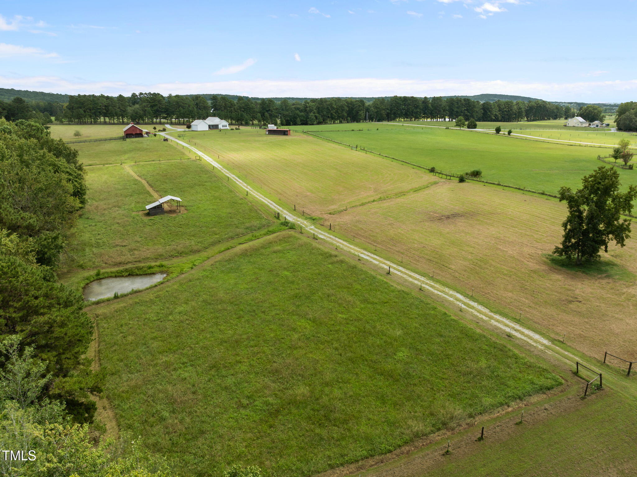 4715 Uzzle Road Rougemont, NC 27572 - Photo 59 of 68 a view of a lake with a big yard