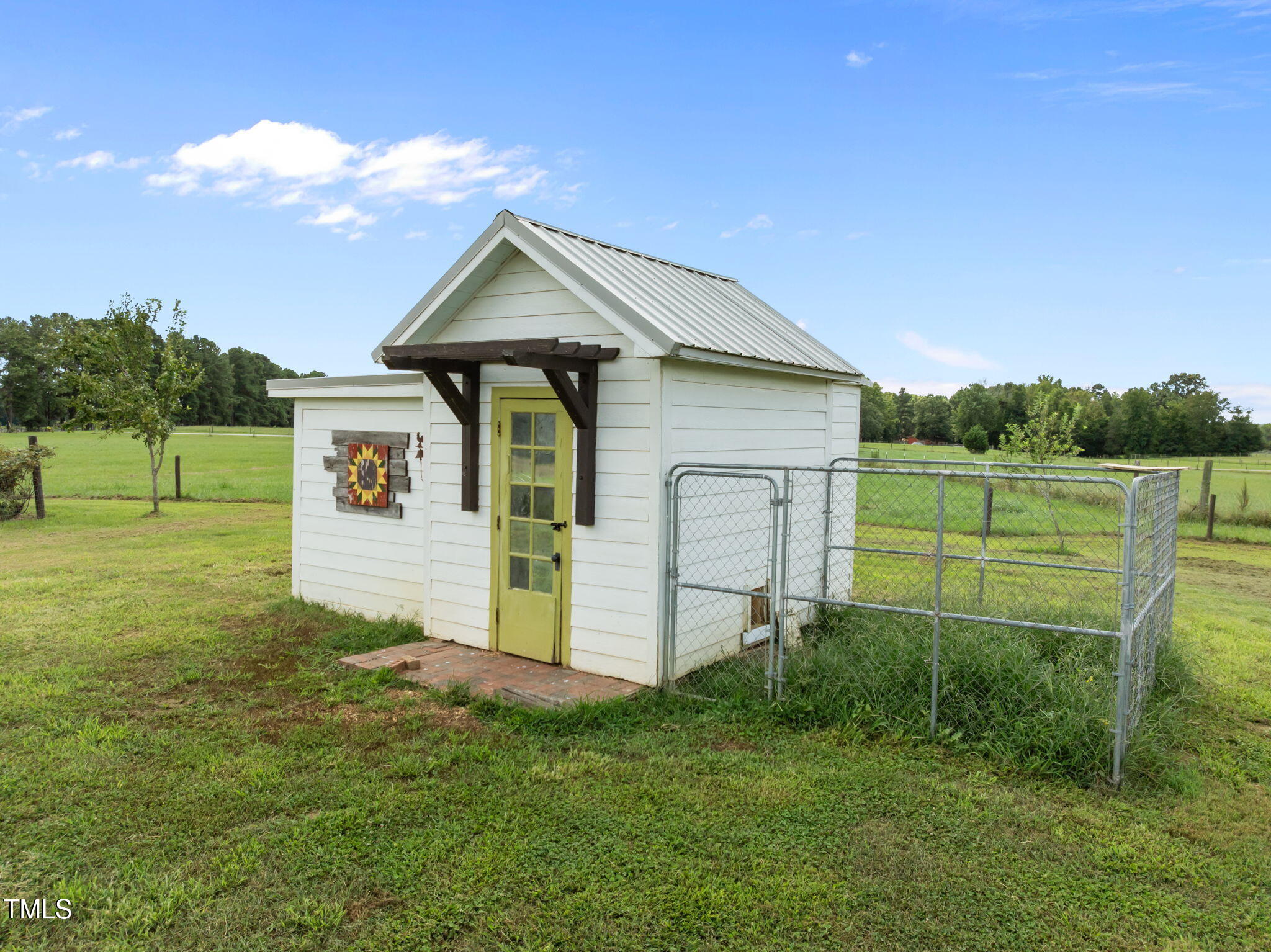 4715 Uzzle Road Rougemont, NC 27572 - Photo 62 of 68 a front view of a house with a yard