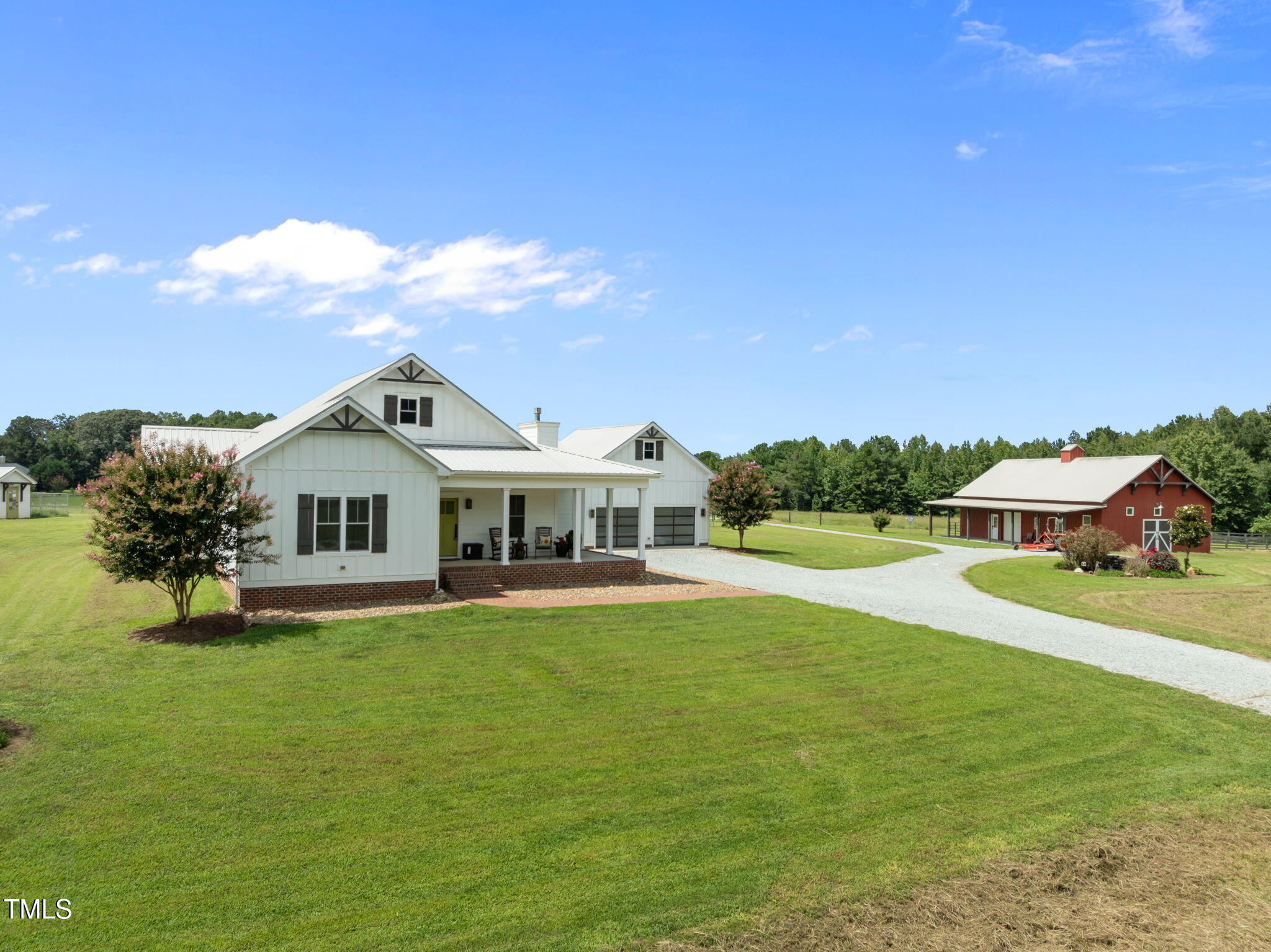 4715 Uzzle Road Rougemont, NC 27572 - Photo 65 of 68 a front view of a house with a yard