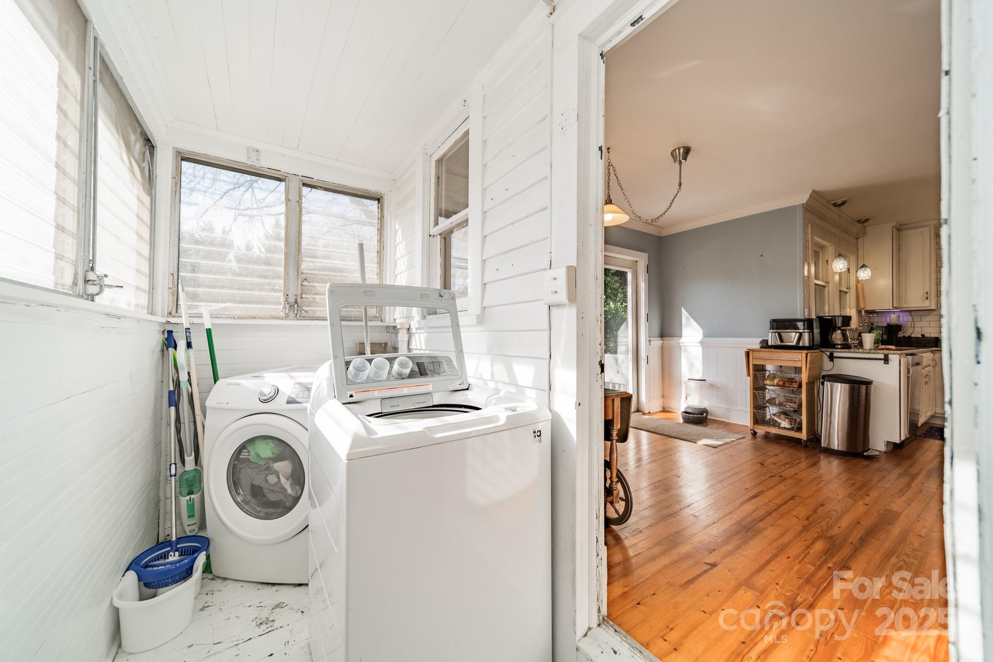 503 4th Street Spencer, NC 28159 - Photo 12 of 30 a view of a kitchen with washer and dryer