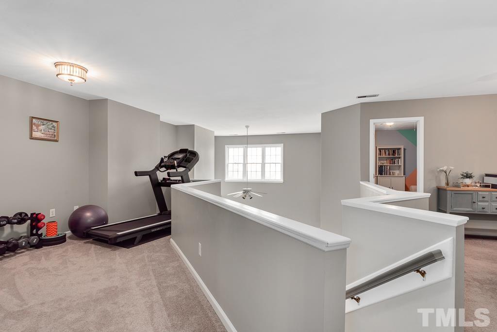 7030 Sandy Forks Road, Unit 103 Raleigh, NC 27615 - Photo 17 of 36 a view of a room with gym equipment