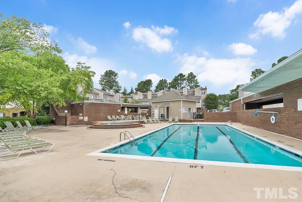 7030 Sandy Forks Road, Unit 103 Raleigh, NC 27615 - Photo 36 of 36 a view of a house with pool