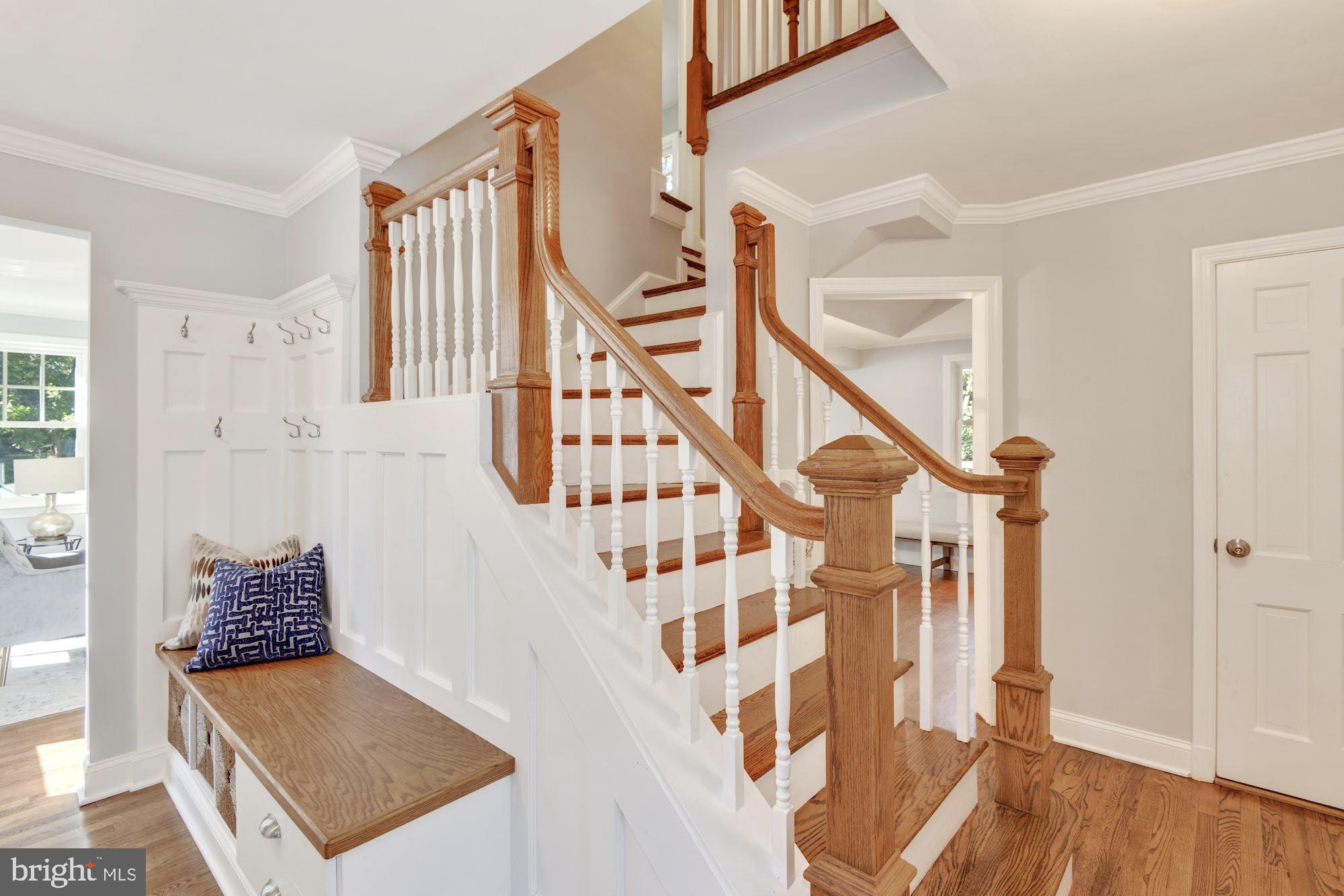 9200 Harvey Road Silver Spring, MD 20910 - Photo 3 of 28 New banister and entry bench in foyer