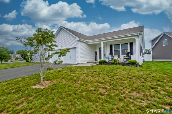 a house view with a garden space