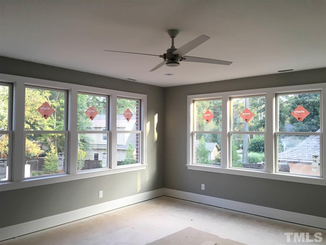 1416 Ridge Road Raleigh, NC 27607 - Photo 8 of 11 a view of an empty room with a window
