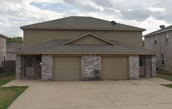 front view of a house with a garage