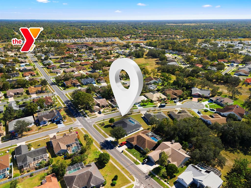 10464 Henderson Street Spring Hill, FL 34608 - Photo 60 of 62 an aerial view of a house with a garden