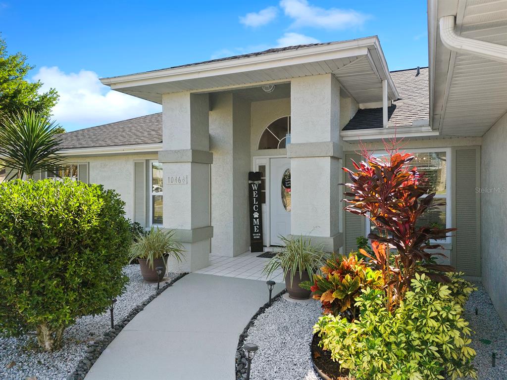 10464 Henderson Street Spring Hill, FL 34608 - Photo 7 of 62 front view of a house