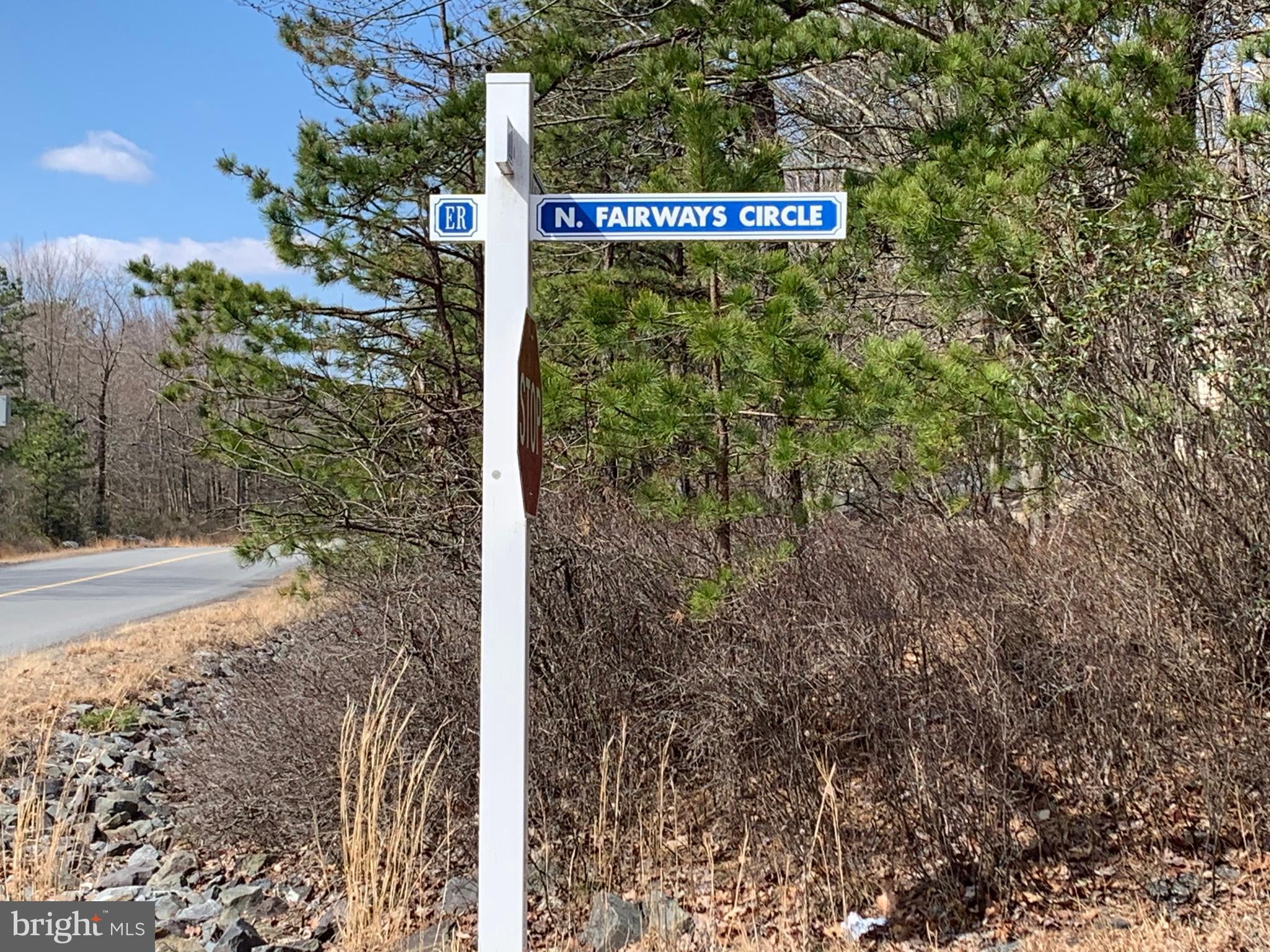 0 North Fairway Circle Hazleton, PA 18202 - Photo 2 of 16 a sign broad in front of the red and white house