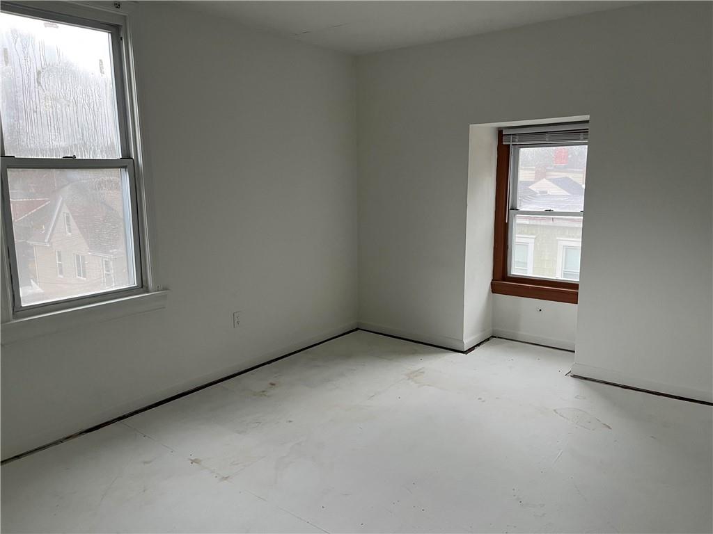 1700 Haug Street Pittsburgh, PA 15212 - Photo 16 of 32 a view of an empty room with a window