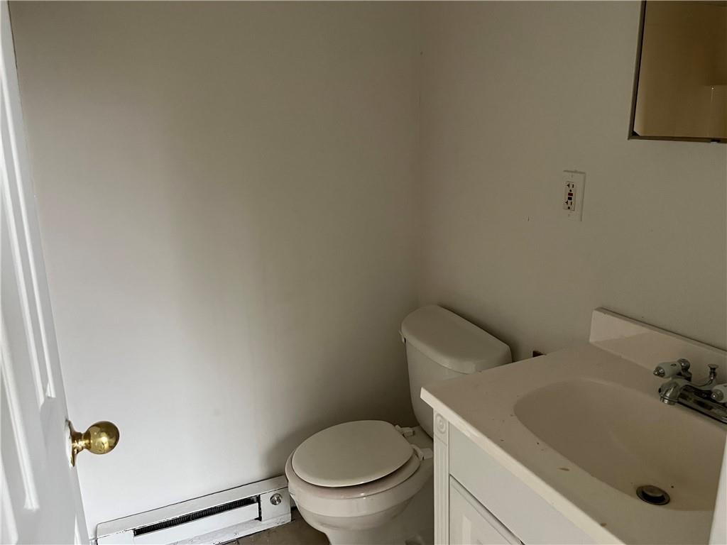1700 Haug Street Pittsburgh, PA 15212 - Photo 22 of 32 a bathroom with a sink and a toilet