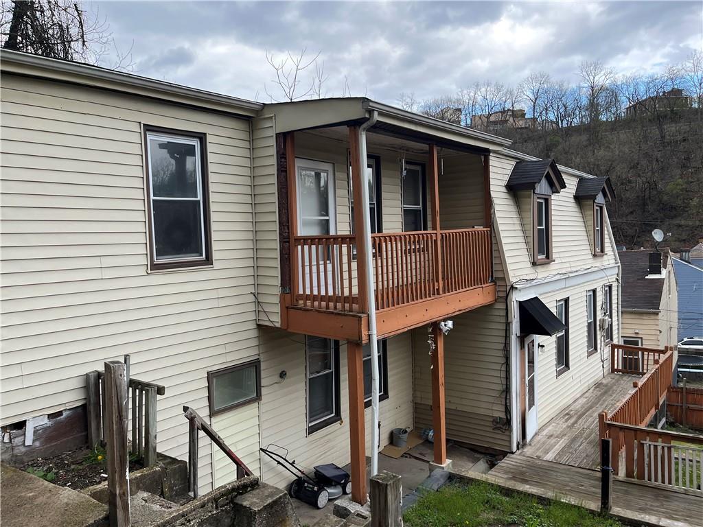 1700 Haug Street Pittsburgh, PA 15212 - Photo 3 of 32 a front view of a house with balcony