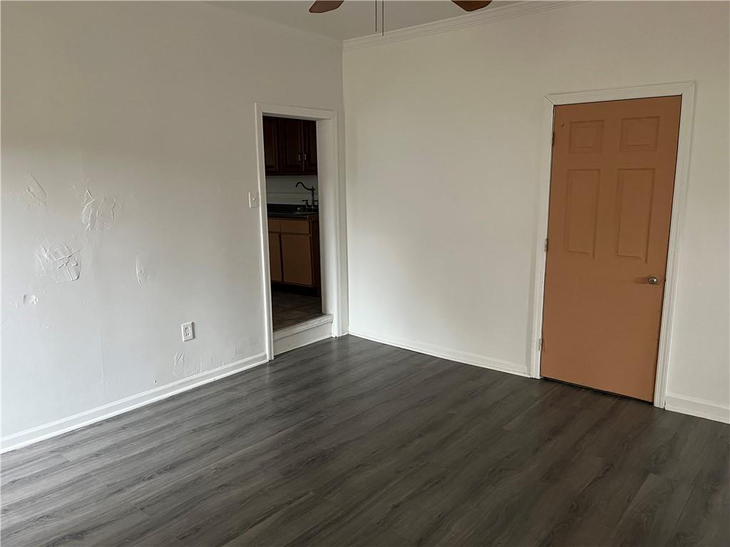 1700 Haug Street Pittsburgh, PA 15212 - Photo 6 of 32 a view of an empty room with wooden floor and closet