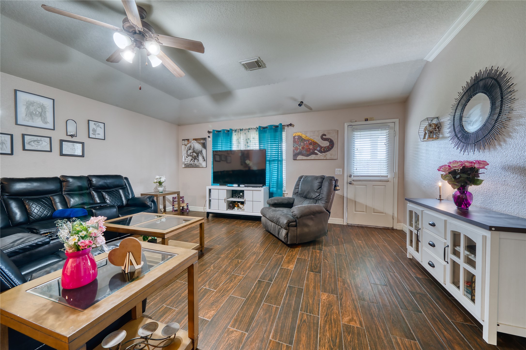 2210 Mountain Ranch Drive Houston, TX 77049 - Photo 16 of 36 a living room with furniture and a flat screen tv