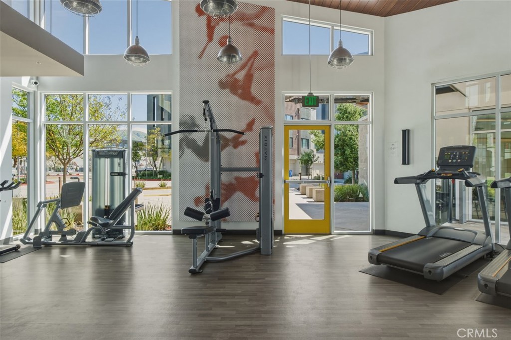 45235 Wisdom Road, Unit 1003 Fremont, CA 94538 - Photo 23 of 32 a view of a room with gym equipment