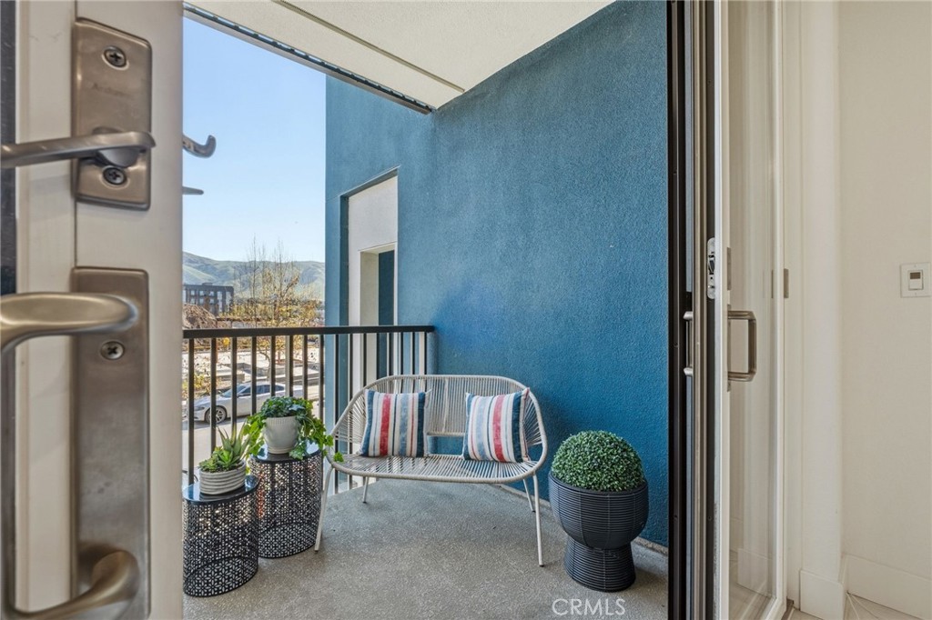 45235 Wisdom Road, Unit 1003 Fremont, CA 94538 - Photo 6 of 32 a hallway with sliding door
