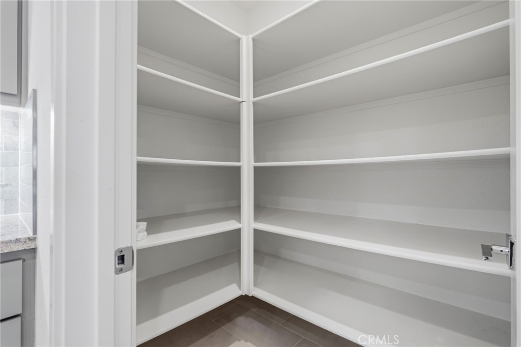 45235 Wisdom Road, Unit 1003 Fremont, CA 94538 - Photo 10 of 32 a view of walk in closet with empty racks