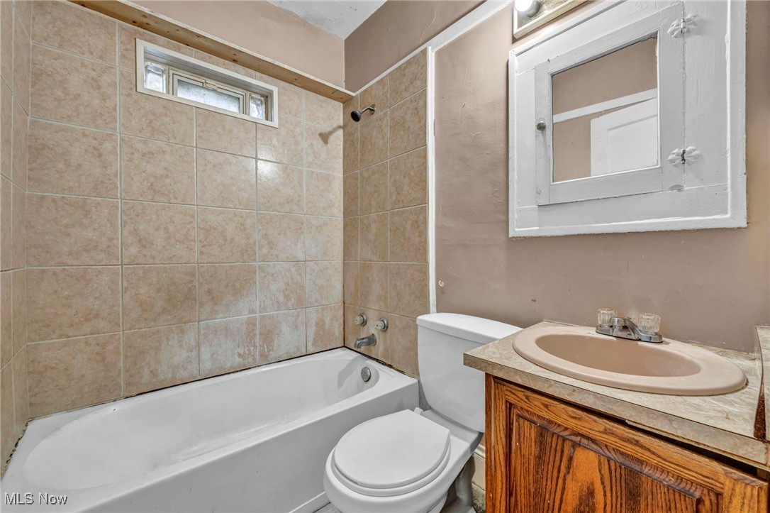 949 Rudyard Road Cleveland, OH 44110 - Photo 25 of 42 Full bathroom featuring shower / washtub combination and vanity