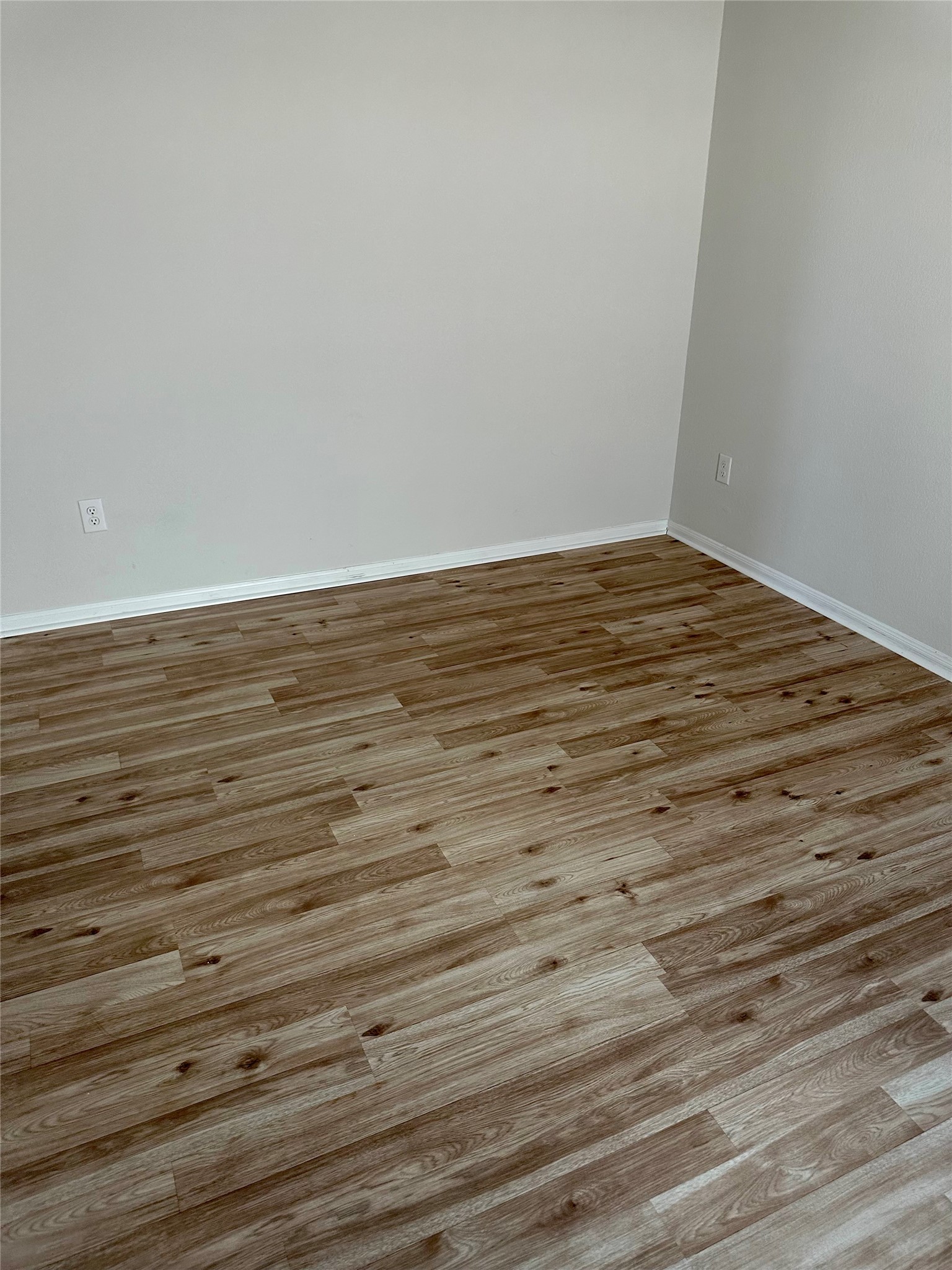 1003 Cherrystone Loop Buda, TX 78610 - Photo 20 of 27 a view of empty room with wooden floor