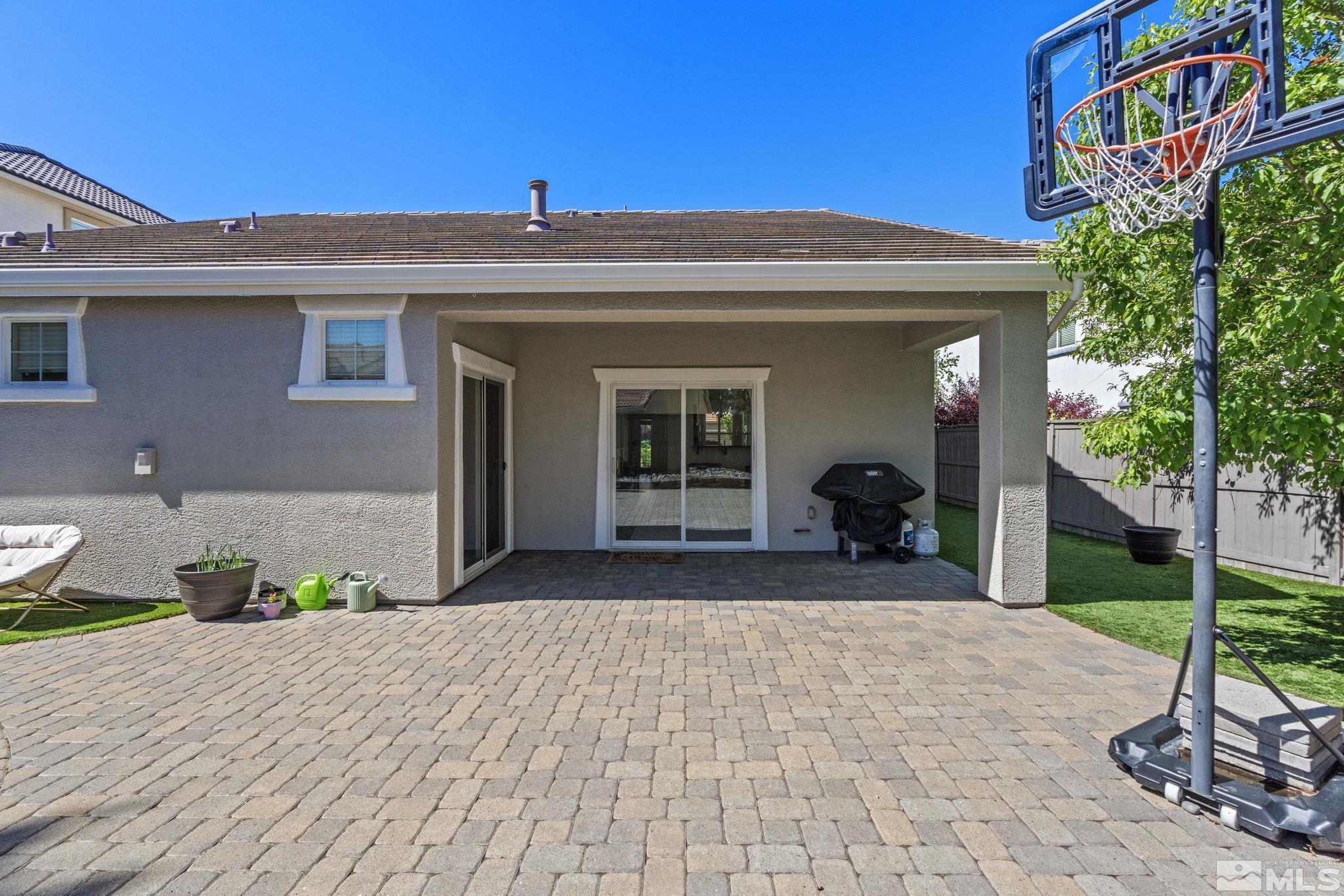 541 Needles Court Reno, NV 89521 - Photo 25 of 35 a front view of a house with garden