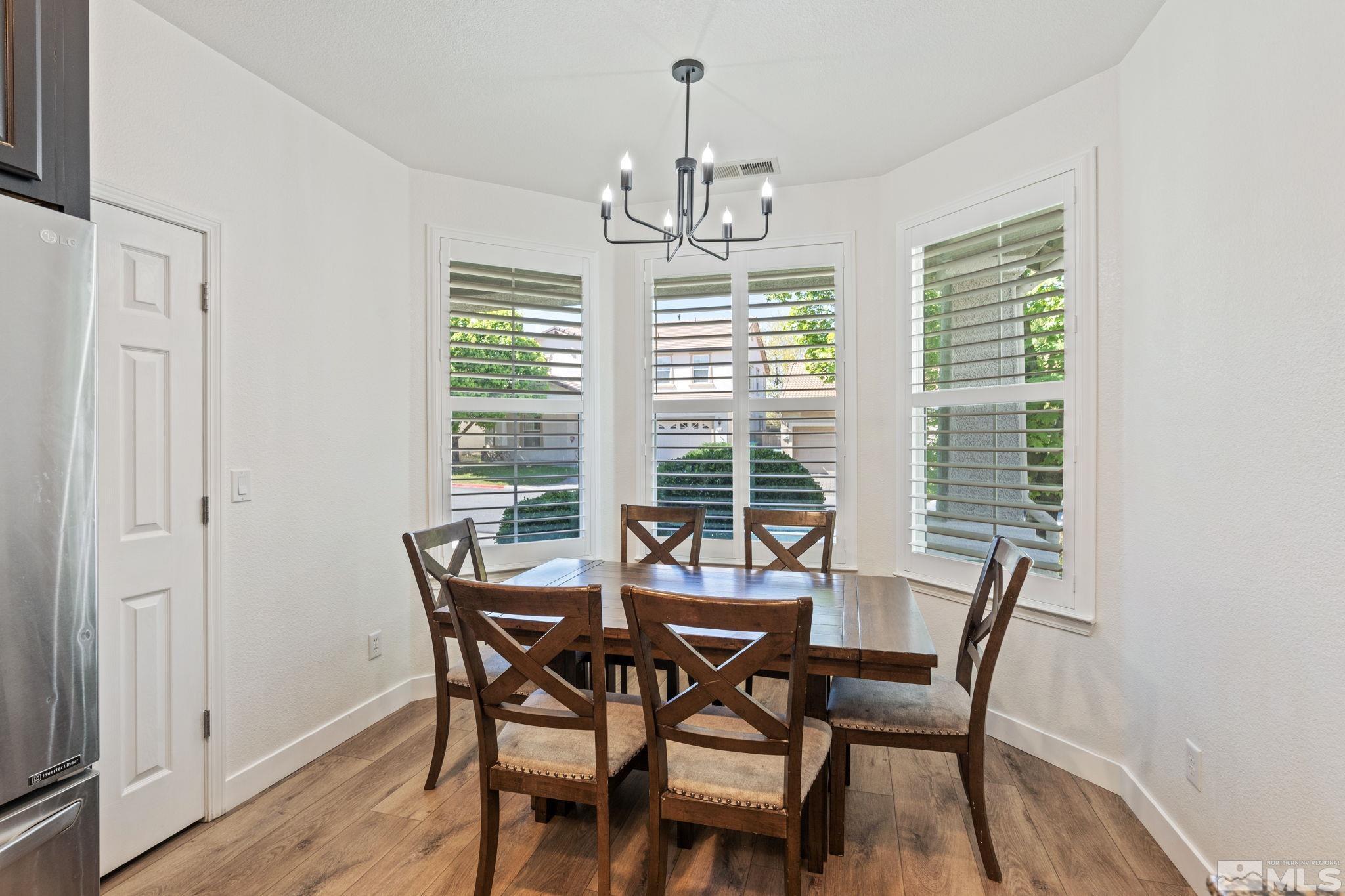 541 Needles Court Reno, NV 89521 - Photo 31 of 35 a view of a dining room with furniture window and outside view
