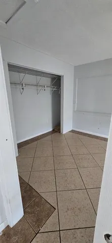 a view of a room with an empty space