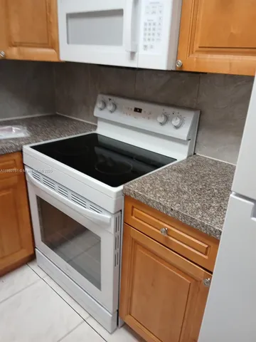 a view of an outdoor space and a yard