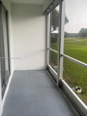 a view of a building and a garden