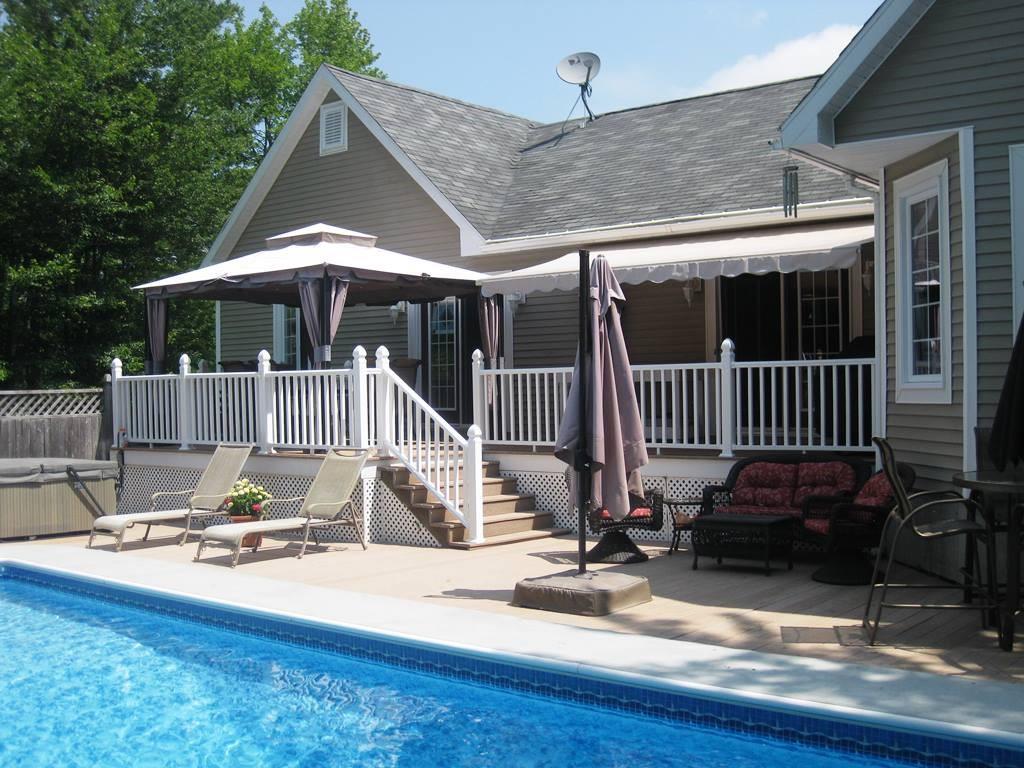 22 Deerfield Road Ellsworth, ME 04605 - Photo 24 of 35 The view across the pool to the back...