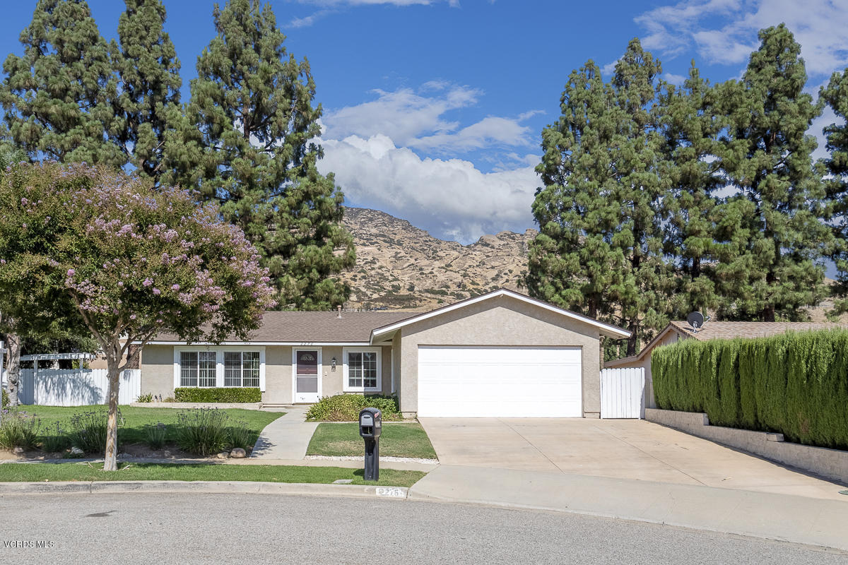 2276 Rohner Court Simi Valley, CA 93063 - Photo 1 of 20 a front view of a house with a yard and garage