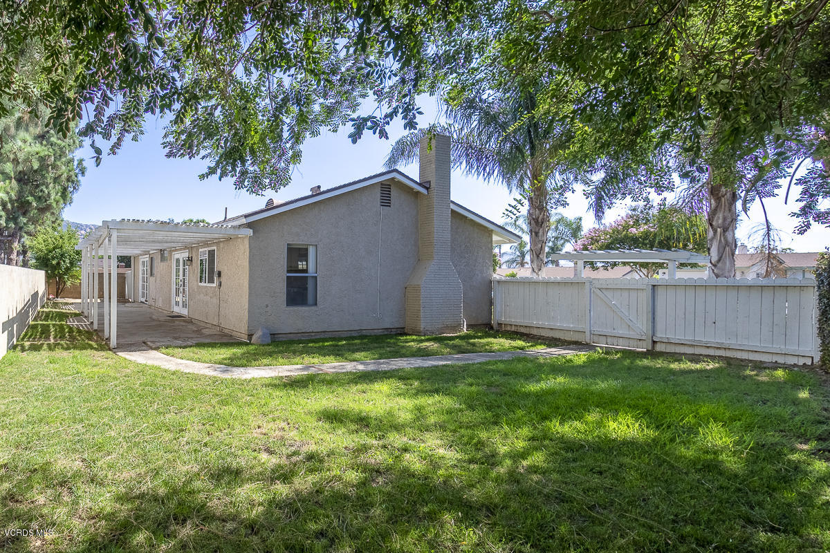 2276 Rohner Court Simi Valley, CA 93063 - Photo 20 of 20 a backyard of a house with plants and large tree