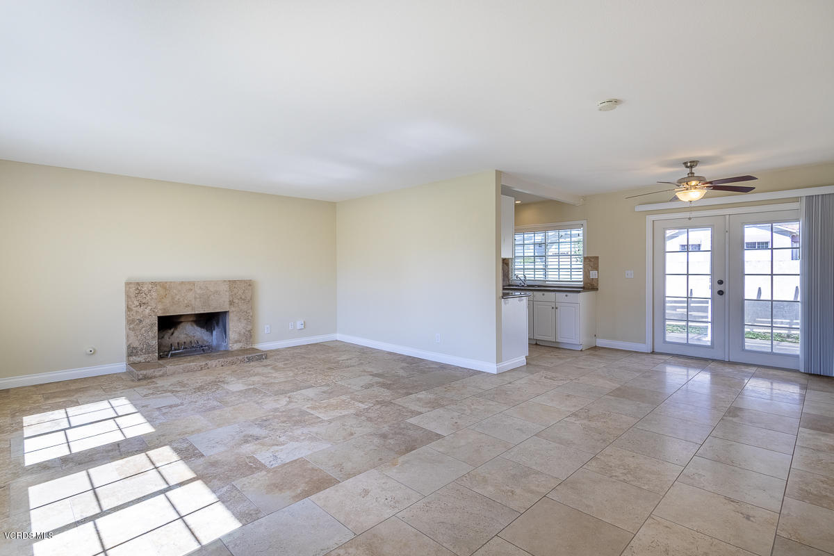 2276 Rohner Court Simi Valley, CA 93063 - Photo 4 of 20 a view of an empty room with a fireplace and a window