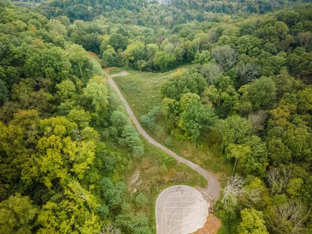 a view of a yard from a balcony