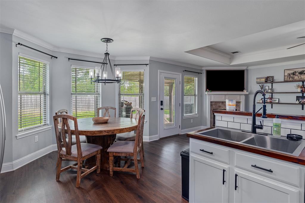 521 Big Red Circle Haughton, LA 71037 - Photo 8 of 19 a dining room with furniture a chandelier and wooden floor