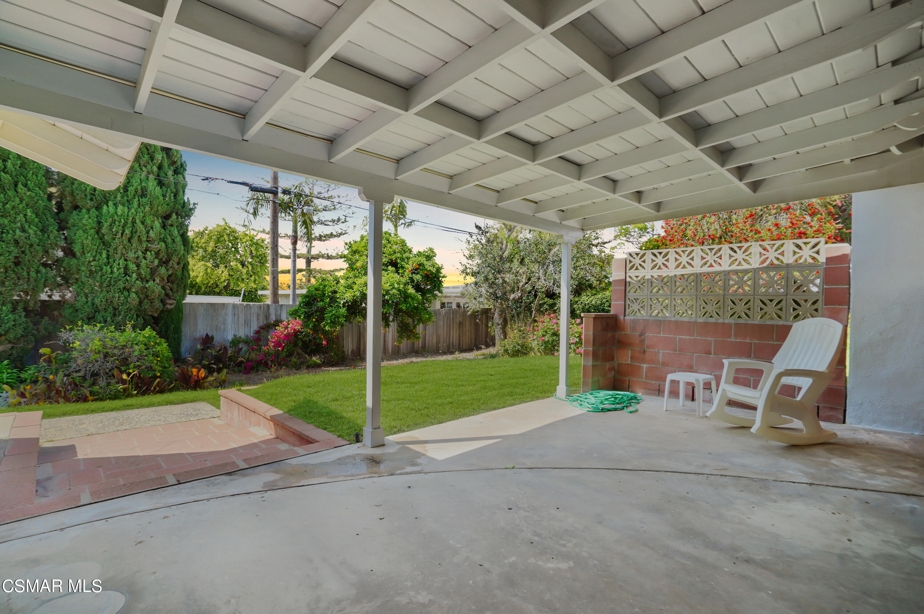 16 Mansfield Lane Camarillo, CA 93010 - Photo 17 of 22 a view of a porch with furniture and garden