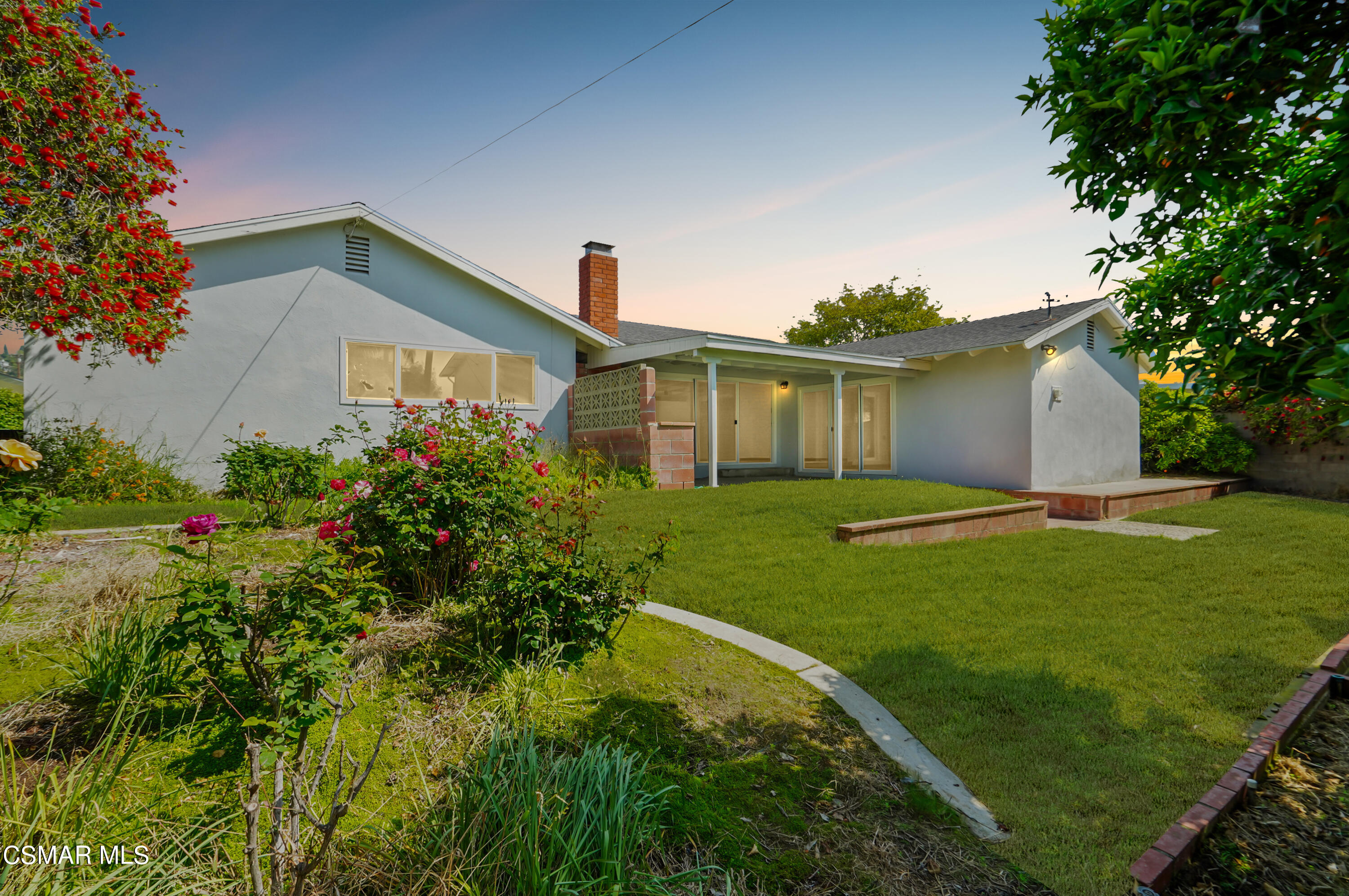 16 Mansfield Lane Camarillo, CA 93010 - Photo 20 of 22 a front view of a house with garden