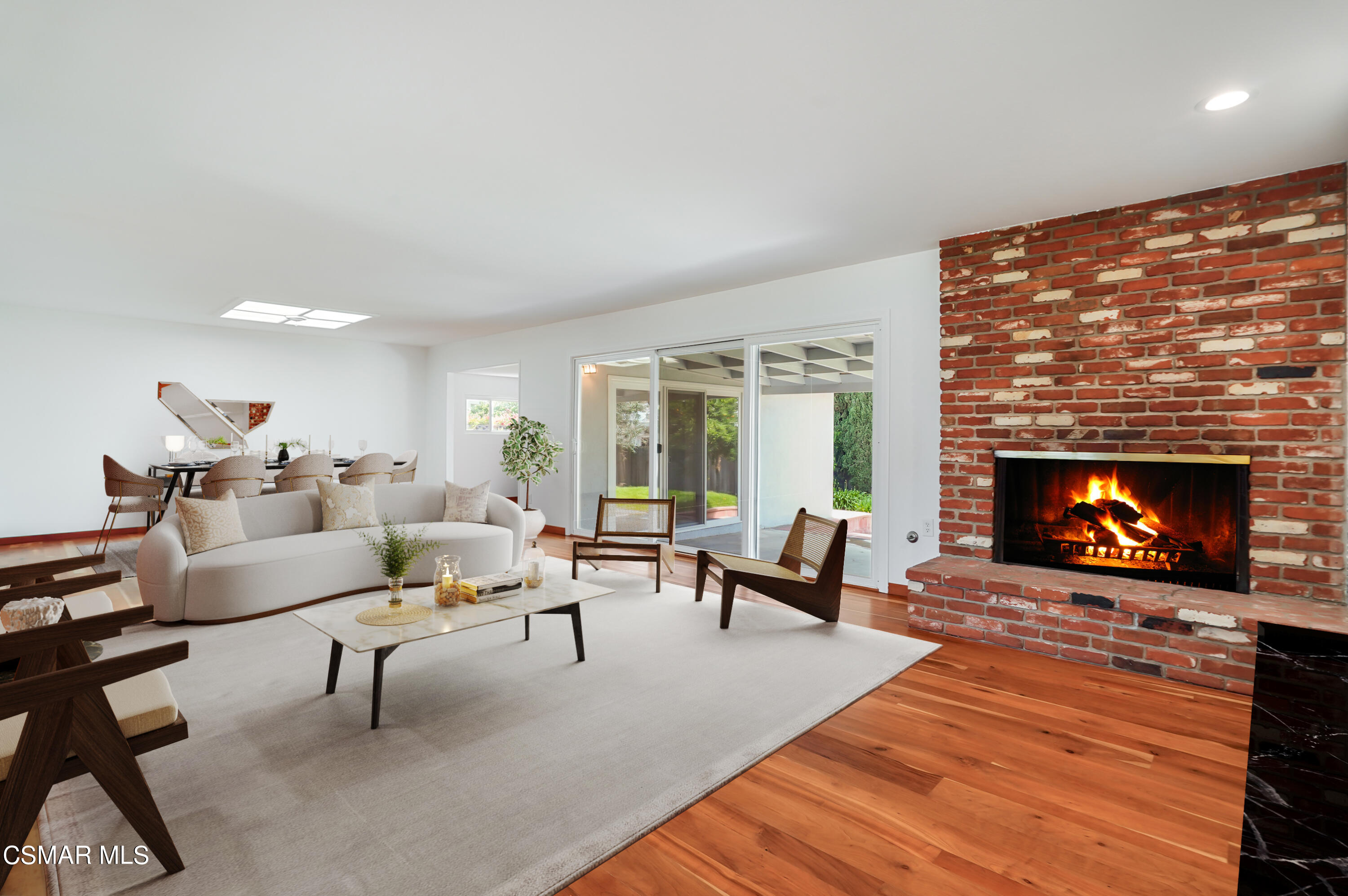 16 Mansfield Lane Camarillo, CA 93010 - Photo 2 of 22 a living room with furniture and a fireplace