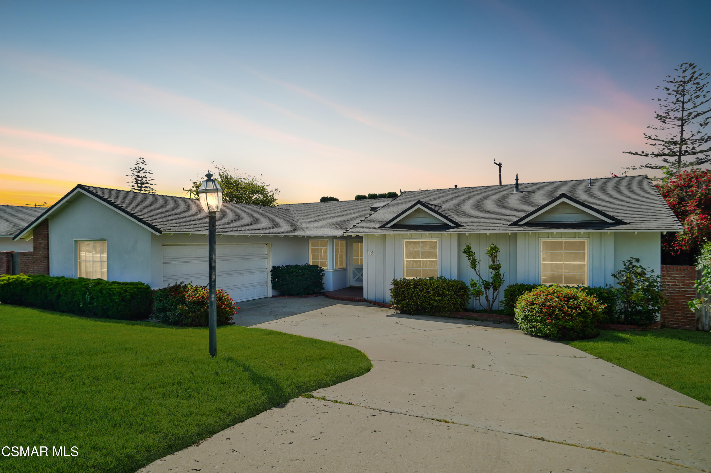 16 Mansfield Lane Camarillo, CA 93010 - Photo 22 of 22 a front view of a house with garden